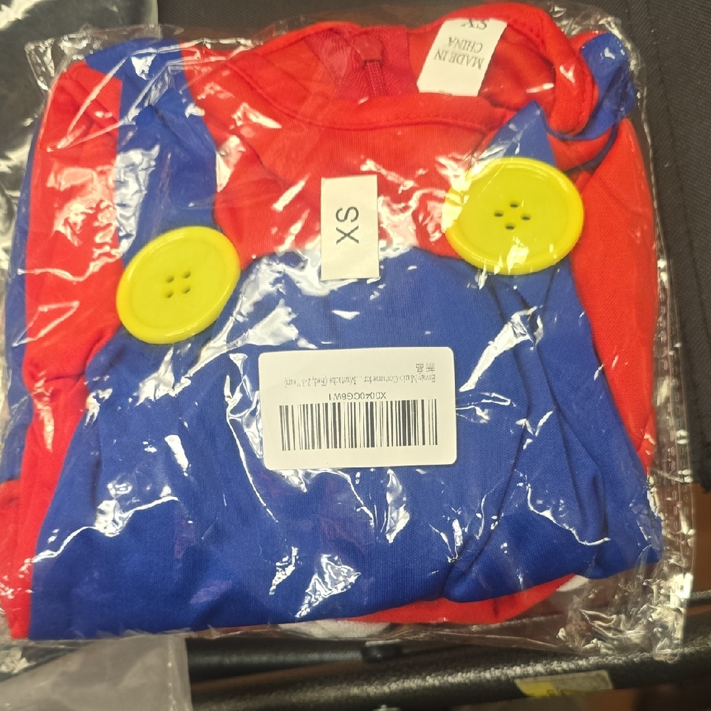 Red and Blue Costume with Yellow Buttons
